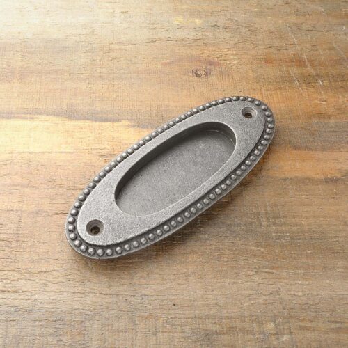 Poignée encastrée ovale motif de points