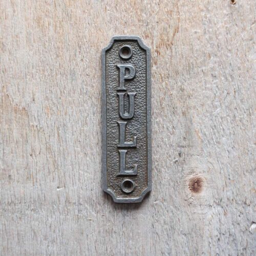 Plaque en fonte pull