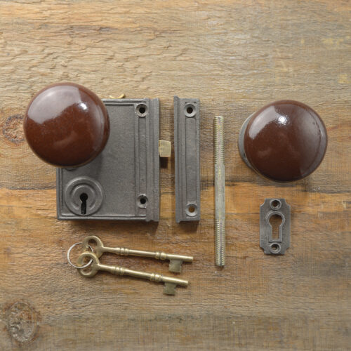 Serrure vertical en fonte avec poignée en porcelaine brune